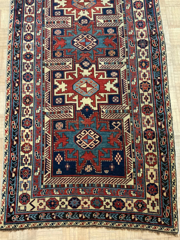 ANTIQUE 3ft. x 7ft. TRANSITIONAL KAZAK - David Tiftickjian & Sons