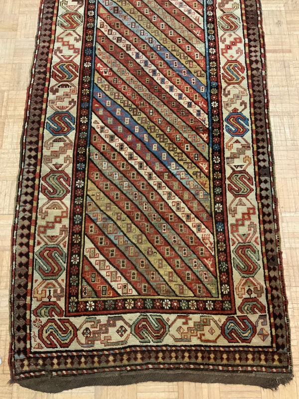 ANTIQUE 4ft. x 10ft. GEOMETRIC KAZAK - David Tiftickjian & Sons