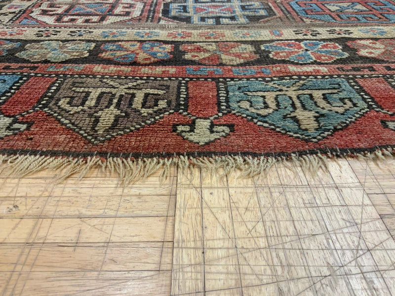 ANTIQUE 4ft. x 7ft. GEOMETRIC KAZAK - David Tiftickjian & Sons
