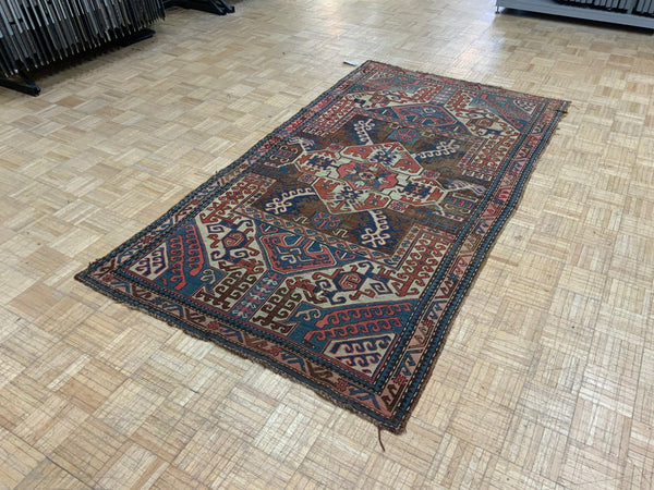 ANTIQUE 4ft. x 8ft. GEOMETRIC KAZAK - David Tiftickjian & Sons