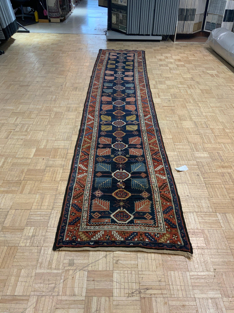 VINTAGE 3ft. x 15ft. GEOMETRIC KAZAK - David Tiftickjian & Sons