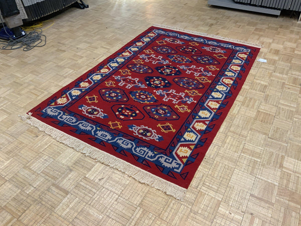 VINTAGE 5ft. x 8ft. TRANSITIONAL KAZAK - David Tiftickjian & Sons