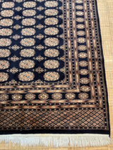 VINTAGE 6ft. x 9ft. GEOMETRIC BOKARA - David Tiftickjian & Sons