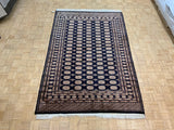 VINTAGE 6ft. x 9ft. GEOMETRIC BOKARA - David Tiftickjian & Sons