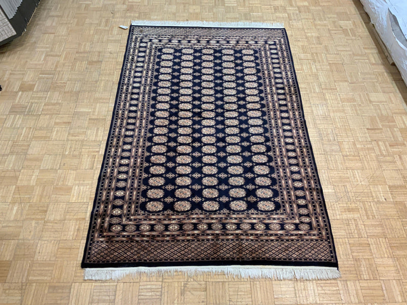 VINTAGE 6ft. x 9ft. GEOMETRIC BOKARA - David Tiftickjian & Sons